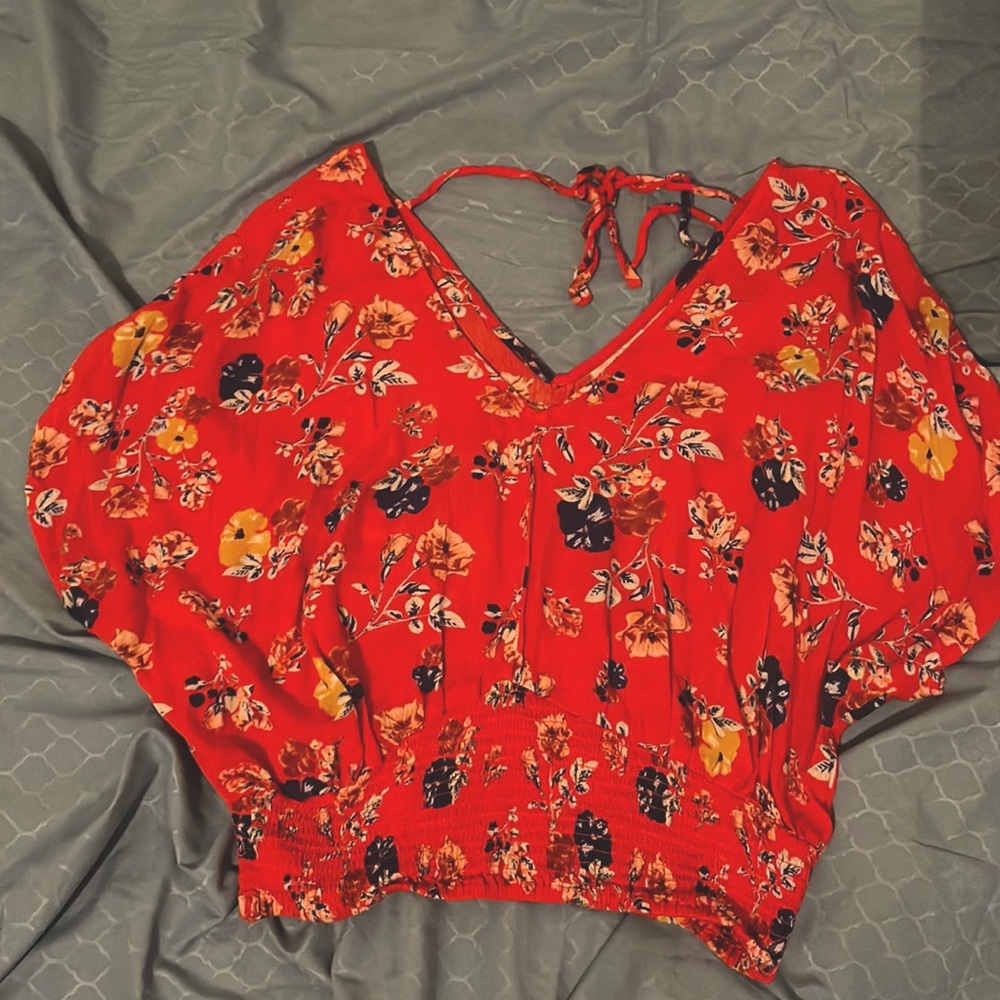 Vibrant and fun scarlet red top!